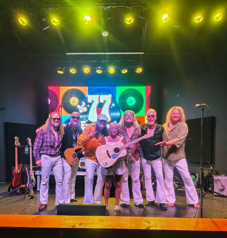 win-a-guitar-imagewith-band-and-winner-on-stage