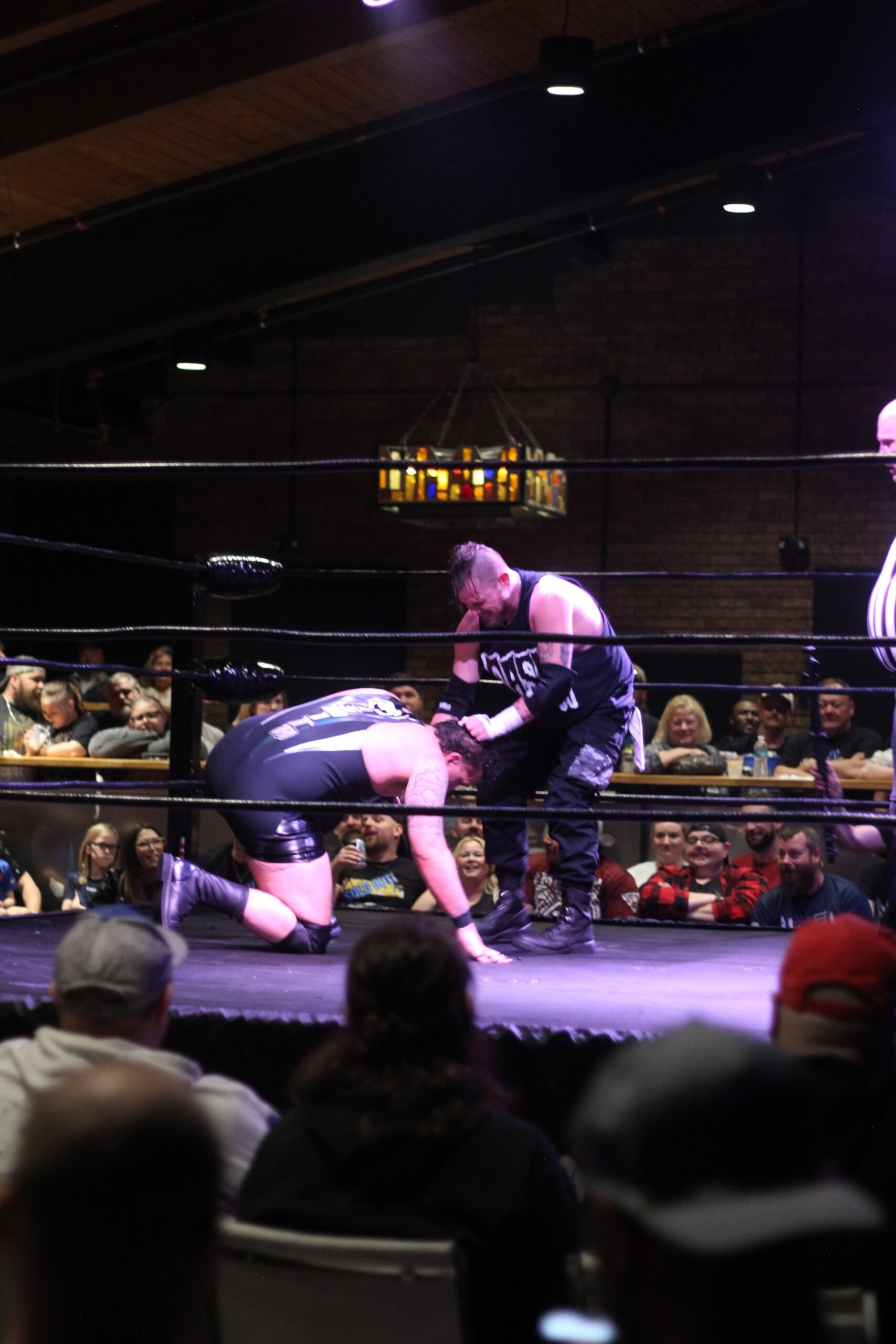 Wrestlers fighting in ring